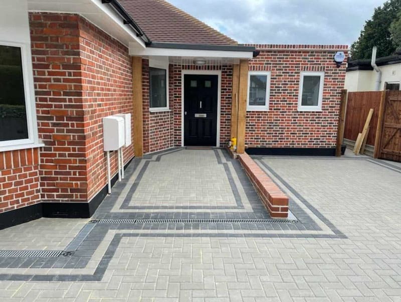 Completed block-paved frontage with drainage detail by Harcourt Exteriors