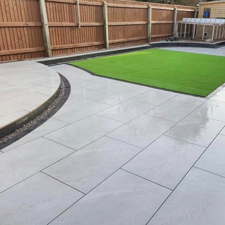Completed garden transformation with defined boundaries